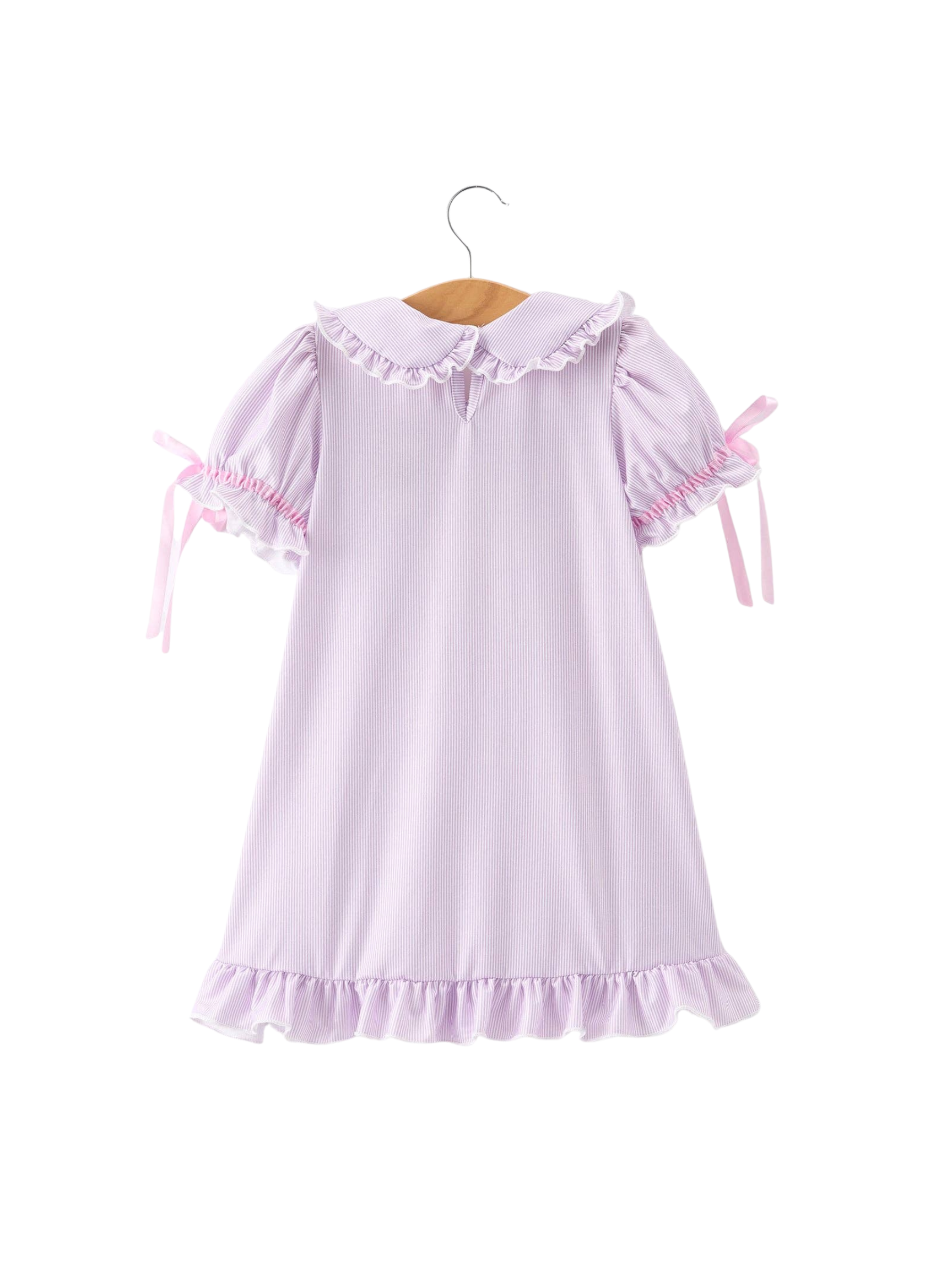 Lavender dress with ruffled details on a white background